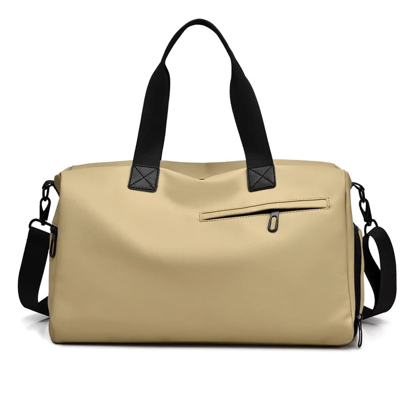 Beige duffel bag with black handles, zipper pocket, and detachable shoulder strap