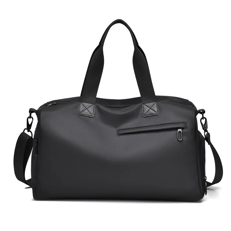 Sleek black duffel bag with top handles, shoulder strap, and front zip pocket for travel or gym